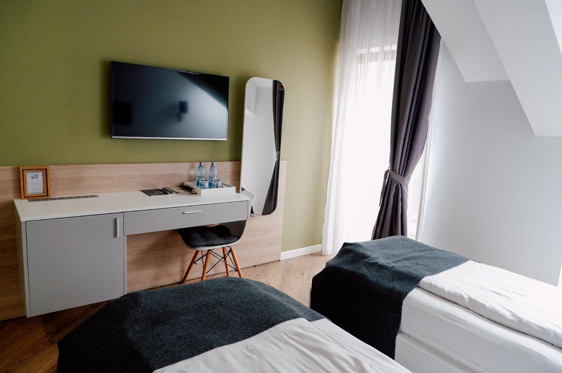 Cameră twin cu balcon